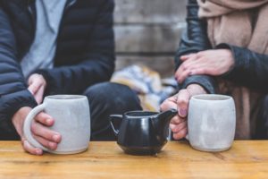 Man and Woman Having a Tea Conversation